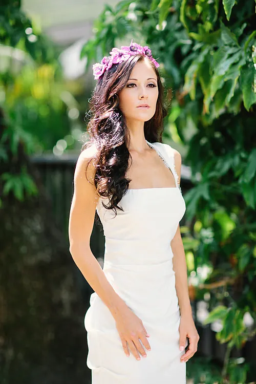 Bride with a flower crown in a garden