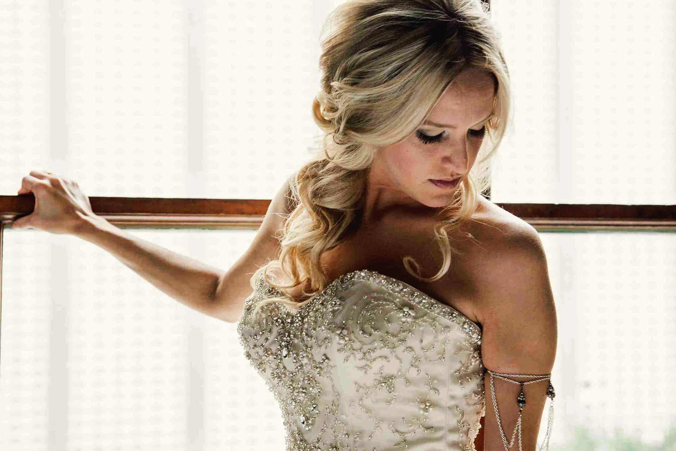 Bride by a window in soft light