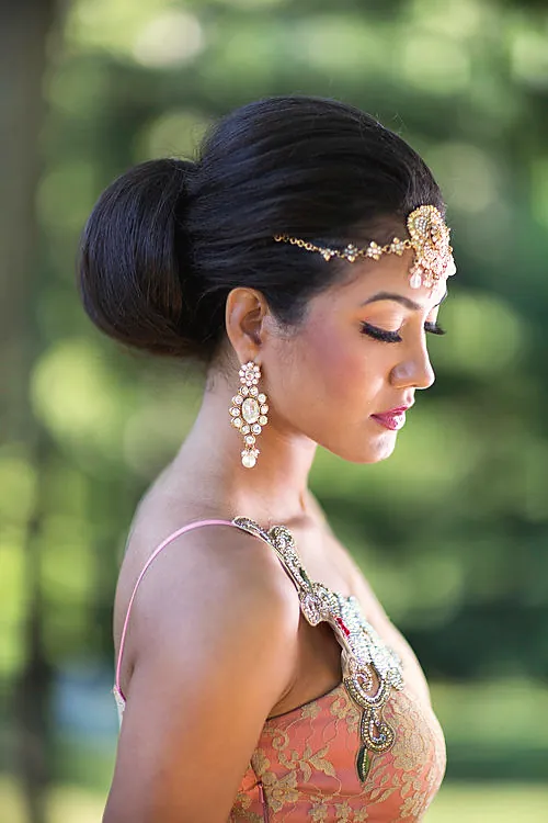 Bride in coral with a jeweled headpiece