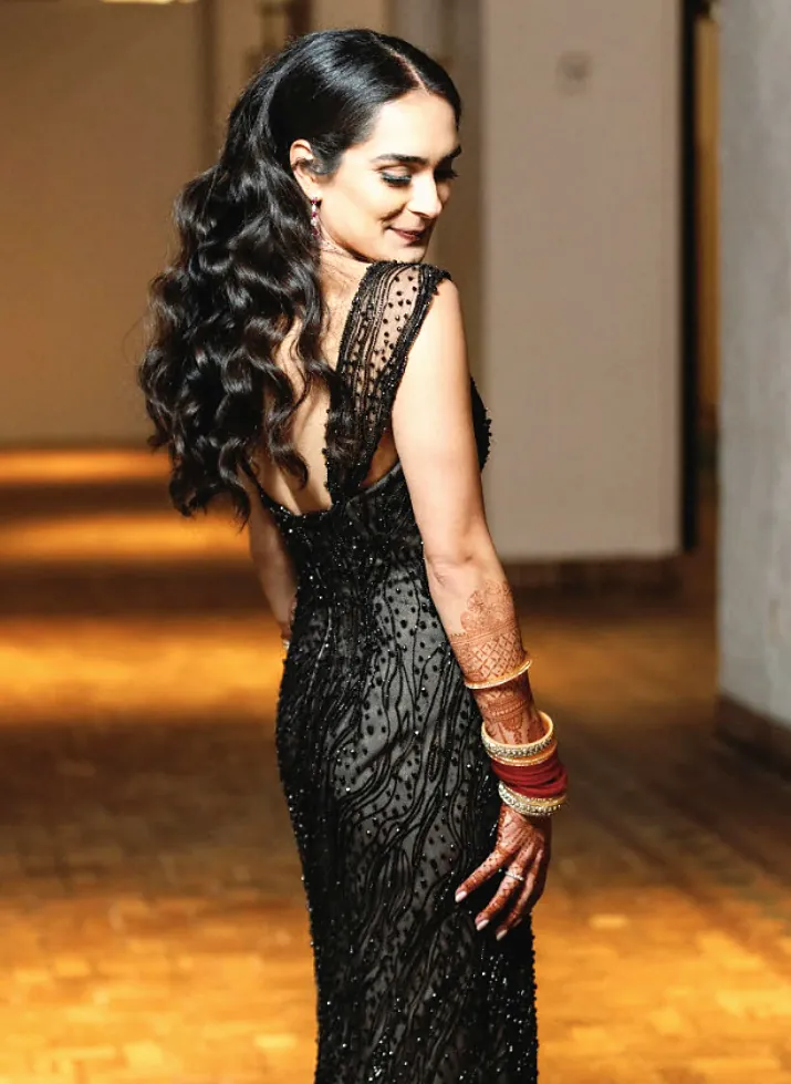 Woman in a black beaded gown